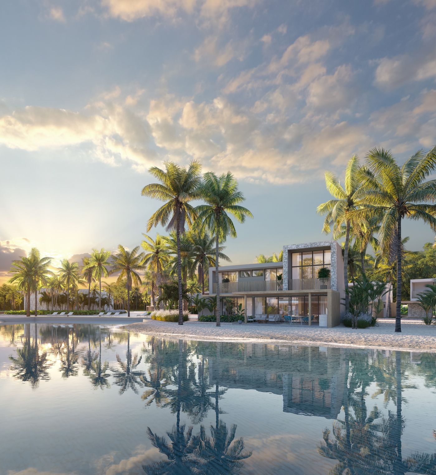 Beach House reflected in private freshwater lagoon at golden hour